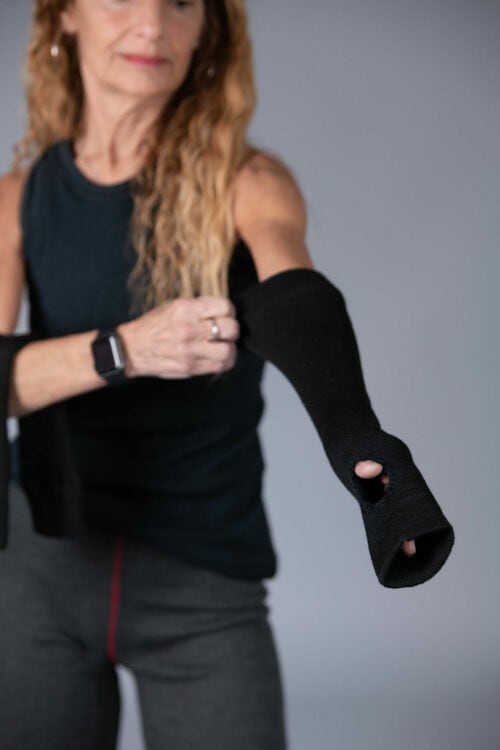 Woman wearing Seraphina Safety's Flame Resistant FR Tech™ Fitted Sleeves